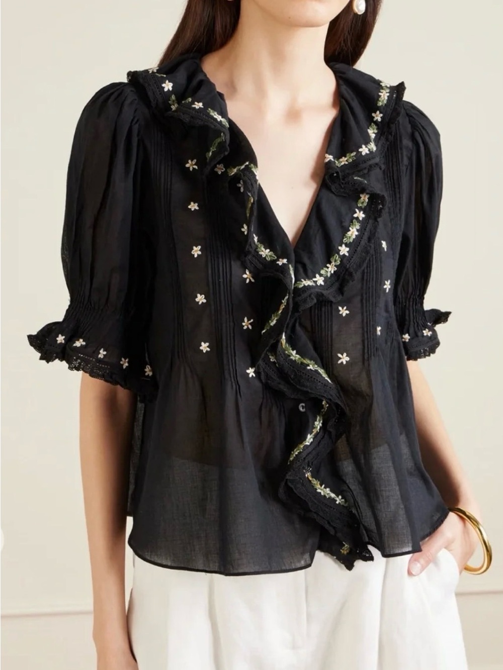 Dôen
Hettie floral embroidered ruffled cotton blouse